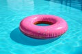 Pink inflatable ring floating in pool of water with blue water. Generative AI Royalty Free Stock Photo