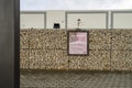 Pink information board informing that Designer Outlet Algarve will be closed due to coronavirus pandemic