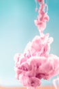 Pink ink in water, artistic shot, abstract background Royalty Free Stock Photo