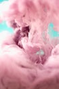 Pink ink in water, artistic shot, abstract background Royalty Free Stock Photo