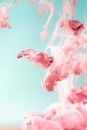 Pink ink in water, artistic shot, abstract background Royalty Free Stock Photo