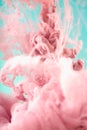 Pink ink in water, artistic shot, abstract background Royalty Free Stock Photo
