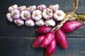 Pink italian onion and garlic braid Royalty Free Stock Photo