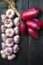 Pink italian onion and garlic braid Royalty Free Stock Photo