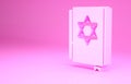 Pink Jewish torah book icon isolated on pink background. Pentateuch of Moses. On the cover of the Bible is the image of