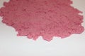 Pink kinetic sand top view. Pink sand. Kids toys