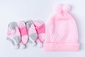 Pink knit hat and socks gift set for a newborn baby girl Royalty Free Stock Photo