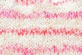 Pink knitted background for baby girl. Horizontal image.