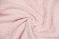 Pink knitted fabric swirl. twisted soft sweater