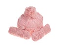 Pink knitted mittens and cap. Royalty Free Stock Photo