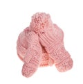 Pink knitted mittens and cap. Royalty Free Stock Photo