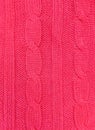 Pink knitted texture background. Pattern of wool knitting for wallpaper and an abstract background Royalty Free Stock Photo