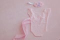 Pink lace body dress for a newborn baby girl, flower hair dressing Royalty Free Stock Photo