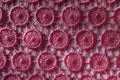 Pink lacy fabric with circular pattern Royalty Free Stock Photo