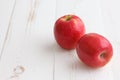 Pink lady apples on a painted wood Royalty Free Stock Photo
