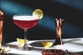 Pink lady classic cocktail drink with dry gin, grenadine syrup, lemon juice and egg white, dark green background, bright hard Royalty Free Stock Photo