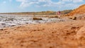 Pink lake made of salt, landscape sea salt, made of microscopic unicellular algae secretes betacaratin minerals grown by