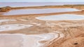 Pink lake made of salt, landscape sea salt, created from microscopic unicellular algae secretes betacaratin min