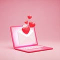Pink Laptop Open With White Envelope And Red Hearts Emerging From Screen computer technology Royalty Free Stock Photo