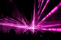 Pink laser show nightlife club stage with party people crowd Royalty Free Stock Photo