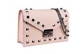 Pink leather handbag isolated on white background