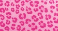 Pink leopard print pattern with various irregular spots scattered across a light pink Royalty Free Stock Photo