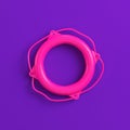 Pink lifebuoy on purple background. Minimalism concept