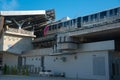 The Pink Line electric train runs on train tracks