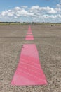 Pink lines on runway