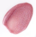 Pink lipgloss smudge over white