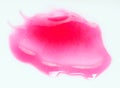 Pink lipgloss smudge over white Royalty Free Stock Photo