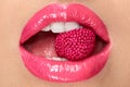 Pink Lips. Woman With Candy In Mouth.