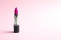 Pink lipstick on background. Space for text Royalty Free Stock Photo