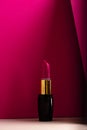 Pink lipstick on modern minimalist background, concept of makeup Royalty Free Stock Photo