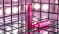Pink lipstick on a shiny surface. Royalty Free Stock Photo