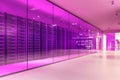 Pink-lit server room corridor, data center interior Royalty Free Stock Photo