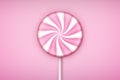 Pink Lolipop candy on pastel pink background.
