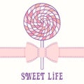 Pink lollipop with ribbon