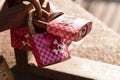 Pink love locks with skulls and crossbones