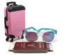 Pink luggage, Thai passport with banknotes and fashion sunglasses Royalty Free Stock Photo