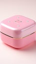 A pink lunch box sitting on top of a table. Generative AI image.