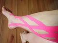 lymfatic tape on a leg after operation Royalty Free Stock Photo