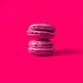 Pink macaron on color background