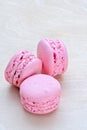 Pink macaron on wooden background