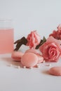 Pink macaroons with bouquet of rose on marble table, pastel colored, Royalty Free Stock Photo