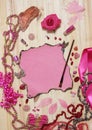 Pink and Magenta Jewelry With Flower and Blank Paper With Burned Edges Royalty Free Stock Photo