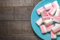 Pink marshmallows on a dark background