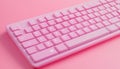 Pink mechanical keyboard on a pastel backdrop with soft lighting