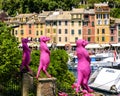 Pink meerkat sculptures, Museo del Parco in Portofino, Italy