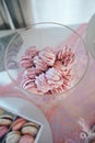 Pink meringues in glass jar. Gentle dessert Royalty Free Stock Photo